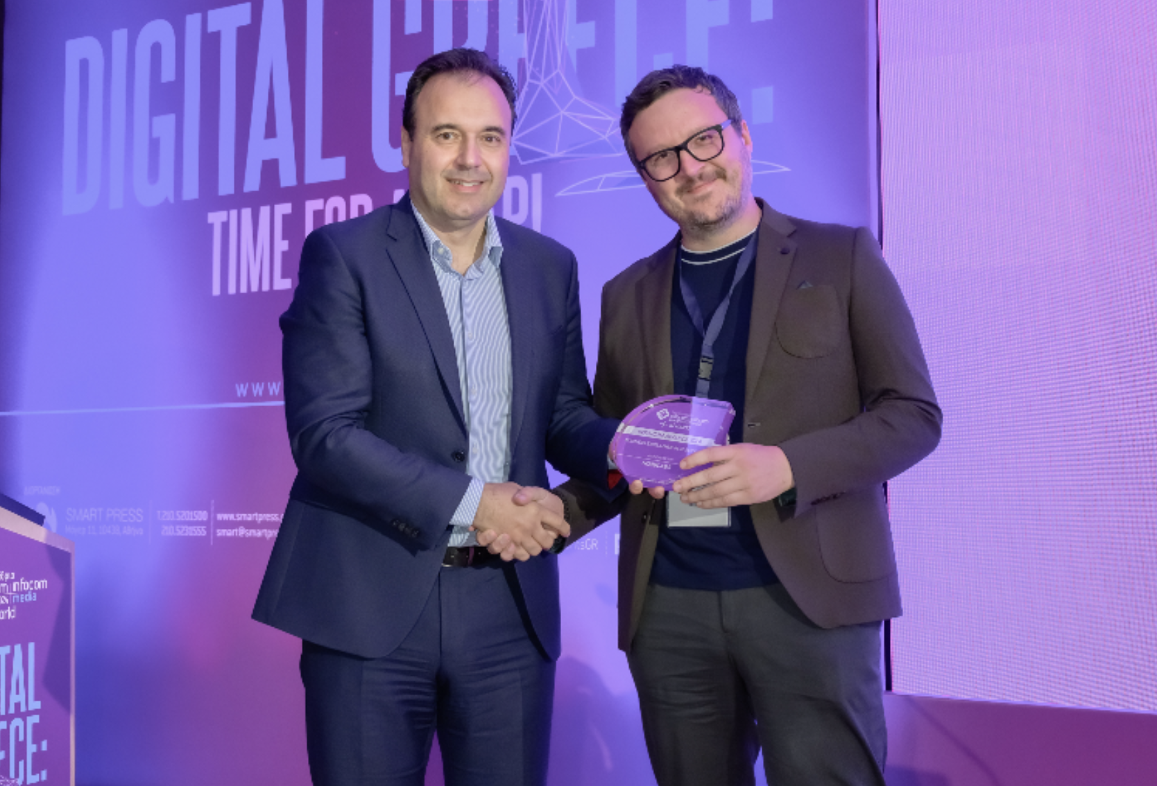 Georgios V. Efstratiadis receiving the Business Excellence in AI Services award from the Greek Minister of Digital Governance at Digital Greece
